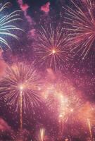 Fireworks bursting in the sky above a festive celebration, with shimmering sparks falling gracefully photo