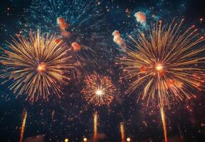 Fireworks bursting in the sky above a festive celebration, with shimmering sparks falling gracefully photo