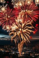 Golden and red fireworks spreading across the sky, with city lights twinkling in the background photo