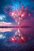 Fireworks reflecting on the water as they explode in the sky, creating a mirror effect with vibrant colors photo