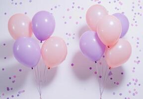 Soft pink and lavender balloons on the left side, paired with delicate confetti, leaving free space on the right for design elements photo