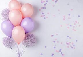 Soft pink and lavender balloons on the left side, paired with delicate confetti, leaving free space on the right for design elements photo