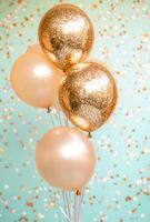 Golden balloons and shimmering confetti against a soft pastel backdrop, with free space in the middle for customization photo