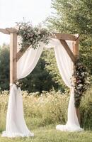 Wedding arch with drapes photo