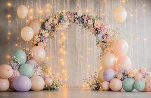 A whimsical birthday setup with a floral arch, pastel-colored balloons, and fairy lights hanging in the background, perfect for a dreamy celebration photo