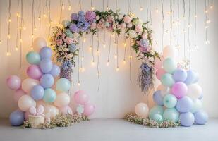 A whimsical birthday setup with a floral arch, pastel-colored balloons, and fairy lights hanging in the background, perfect for a dreamy celebration photo