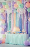A colorful birthday setup with pastel balloons, a large cake table, and streamers hanging from the ceiling, creating a festive atmosphere photo