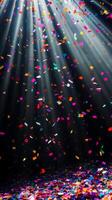 Bright, colorful confetti falling against a dark background, illuminated by sharp rays of light cutting through the scene, creating a festive and dynamic atmosphere photo