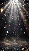 A burst of sparkling confetti, with golden and silver pieces glinting under bright, focused beams of light, set against a dark, mysterious background photo