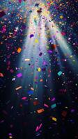 Bright, colorful confetti falling against a dark background, illuminated by sharp rays of light cutting through the scene, creating a festive and dynamic atmosphere photo