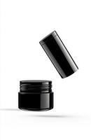 A floating cosmetic tube and jar set, both suspended side by side in mid-air, with a pure white background highlighting their shapes photo