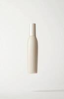 A simple, elongated cosmetic bottle hovering in mid-air, with smooth surfaces and clean lines, suspended against a white background photo