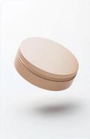 A plain, round cosmetic jar floating at an angle in mid-air, with smooth lighting and subtle reflections on its surface, isolated on white photo