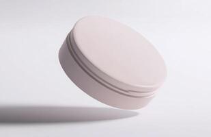 A plain, round cosmetic jar floating at an angle in mid-air, with smooth lighting and subtle reflections on its surface, isolated on white photo
