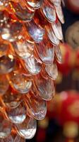 Detailed close-up of shimmering snake scales, with traditional Chinese New Year symbols faintly visible in the background photo