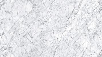 Close-up top view of classic Carrara marble, with soft grey veins running through a white background photo