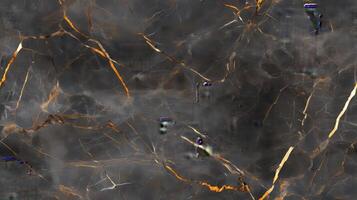 Close-up texture of dark grey marble with metallic gold veins, filling the frame with a luxurious and modern vibe photo