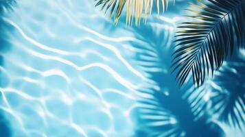 A soft ripple effect in the pool water, with tropical leaf shadows creating depth on the blue background photo