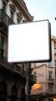 A blank road sign with a white background, mounted on a street post, isolated for mockup photo