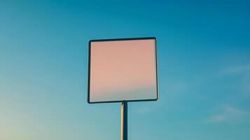 A plain rectangular road sign positioned on a mountain road, no text, with space for mockup or custom content photo