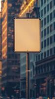 A plain road sign mounted on a pole in the city, against an urban background, with no text photo