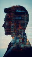 A businessperson in profile, with futuristic architecture and lines of code subtly layered over his form photo