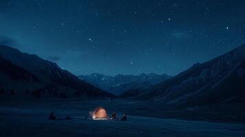 A group of friends camping under the stars in a remote mountain area photo