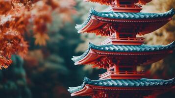 Traditional Japanese pagoda with vibrant red wood and intricate details photo