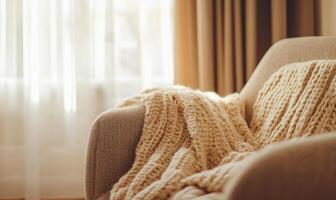 A couch with a white blanket draped over it photo
