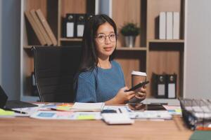 The designer team is designing the uxui system to make the uxui system work well on new phones and support system updates. Website development concept UI UX front end designer photo