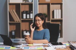 The designer team is designing the uxui system to make the uxui system work well on new phones and support system updates. Website development concept UI UX front end designer photo