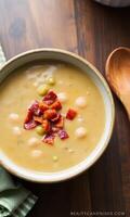 Soup with bacon and beans in a bowl photo