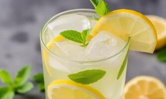 Lemonade with mint leaves and ice photo