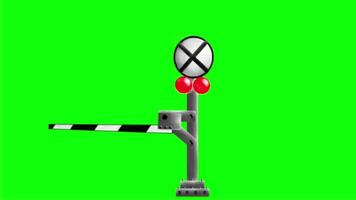 Train crossing signal post with lowered barrier and green background video