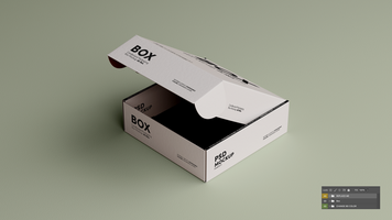 A box with a lid open on a green surface psd