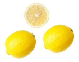 Top view set of two fresh ripe yellow lemon fruits with half or slice isolated on white background with clipping path photo