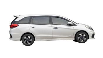 Side view of white hatchback car isolated on white background with clipping path photo