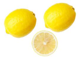 Top view set of two fresh ripe yellow lemon fruits with half or slice isolated on white background with clipping path photo