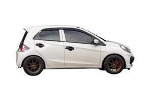 Side view of white mini or small car isolated on white background with clipping path photo
