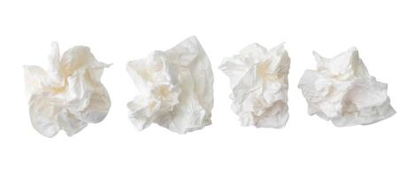 Top view set of screwed or crumpled white tissue paper ball isolated on white background with clipping path photo