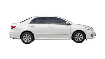 Side view of white sedan car isolated on white background with clipping path photo
