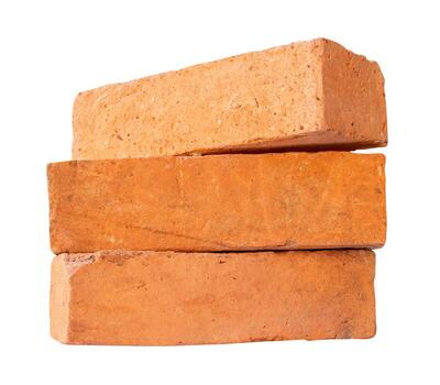 Side view of old red or orange bricks in stack isolated on white background with clipping path photo