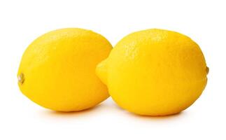 Side view of two fresh ripe yellow lemon fruits in stack isolated on white background with clipping path photo