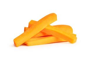 Side view of fresh orange carrot slices in stick shape in stack isolated on white background with clipping path photo