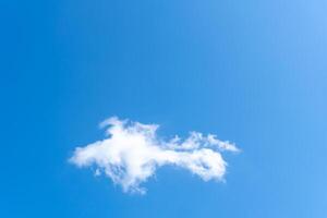 Low angle view of beautiful blue sky with strange shape of clouds in the morning or evening used as natural background texture in decorative art work photo