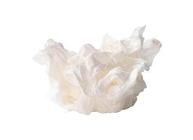 Side view of screwed or crumpled white tissue paper ball isolated on black background with clipping path photo