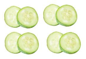 Top view set of fresh green cucumber slices in circle shape in stack isolated on white background with clipping path photo