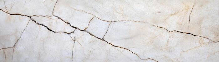 A close up of a white marble wall with cracks photo