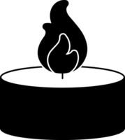 A candle with a flame on it vector