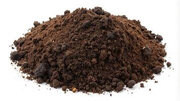 Dark brown soil isolated on white background aerial view photo